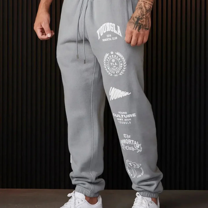 YOUNGLA Jogger Men's tracksuit pants Gym Sports Fitness casual pants Cotton printed bouquet foot pants